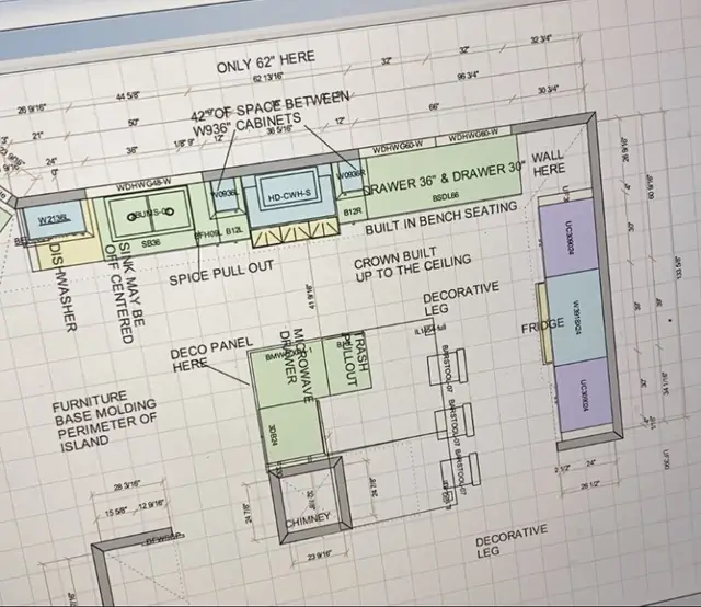 Paula Kinney's annotated kitchen floor plan, hand marked with cabinet dimensions, a spice pull-out and built in bench seating
